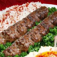 Chicken Lula Kebab (2 Pcs) · Ground chicken with spices broiled on skewers over an open flame. Comes with rice, Armenian ...