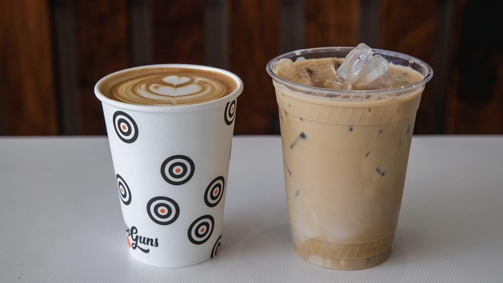 Latte · Double shot of espresso with steamed milk and foam. Available hot or iced.