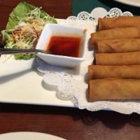 Spring Roll (Crispy Rolls) · Crispy Rolls. Deep fried wrapped vegetarian rolls of cabbage and carrot. Served with sweet a...