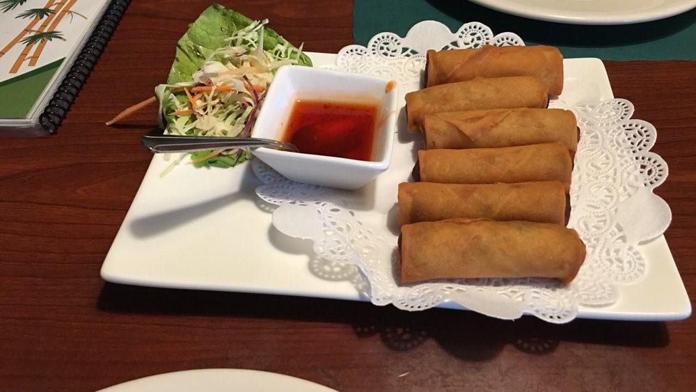 Spring Roll (Crispy Rolls) · Crispy Rolls. Deep fried wrapped vegetarian rolls of cabbage and carrot. Served with sweet and sour sauce.