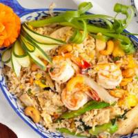 Hawaiian Fried Rice · Stir fried rice with egg, chicken, cashew nut, onion, pea, carrot and pineapple.