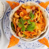 Bamboo Basket · Crispy noodle basket topped with shrimp, chicken, green and red bell pepper, cashew nut and ...
