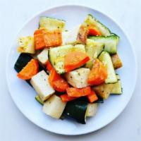 Roasted Vegetables · Zucchini, carrots, and potatoes seasoned with extra virgin olive oil, garlic and rosemary.