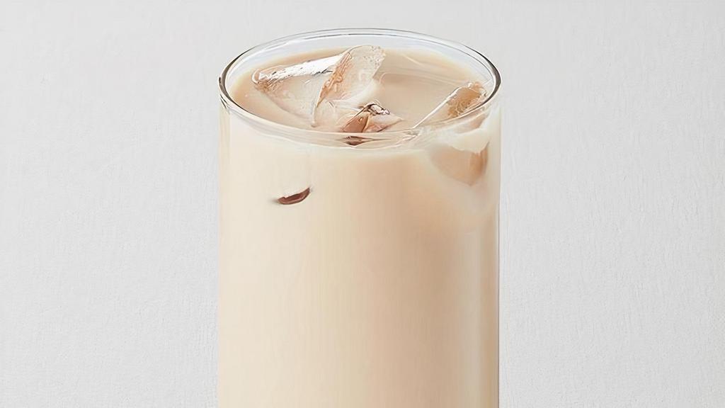 Oolong Milk Tea · Roasted oolong tea combined with our signature house milk