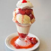Sundae Small - · Served with Vanilla ice cream and a choice of one topping: Marshmallow, Strawberries, Pineap...