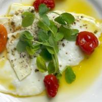 Caprese Salad · Fresh sliced tomatoes, fresh mozzarella, basil, olive oil touch of glazed balsamic vinegar.