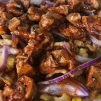 Hawaiian Bbq Chicken Salad · BBQ chicken, romaine, black beans, corn, pineapple, red onions, crunchy onions, crushed pean...