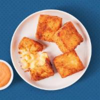 Classic Mac Bites​ · Four golden-fried mac & cheese bites served with Awesome sauce for dipping