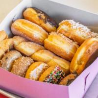1 Dozen Donuts (Assorted) · 12 mixed donuts of our most popular donuts. Based On Availability