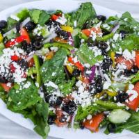 Greek Salad · Romaine lettuce, feta cheese, Greek black olives, red onions romaine lettuce, feta tomatoes,...