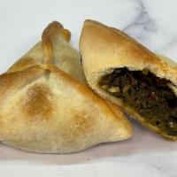 Spinach Boreg · Vegan and delicious, this tangy and slightly spicy spinach turnover is our best seller.