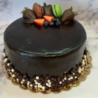 Chocolate Ganache · Delicious 8 inch round cake with chocolate sponge,  chocolate mousse cream and chocolate gan...