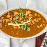 Pindi Chola · Popular Punjabi delicacy, a semi dry chickpea curry assorted with aromatic spices, ginger, t...