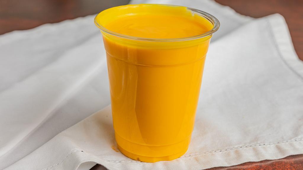 Mango Lassi · A thick milk shake-style Indian drink consisting of a yogurt base and freshly pureed sweet mangoes.