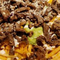 1/2  Carne Asada Fries  · Topped with sour cream, guacamole, cotija cheese and Mexican salsa.