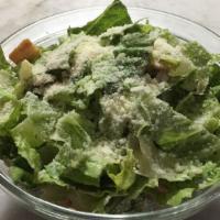 Cesare · Organic Romaine lettuce, shaved parmesan, croutons, Caesar dressing