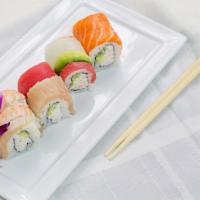 Rainbow Roll · In: snow krab, avocado, cucumber. Top:Tuna, salmon, white fish, shrimp, avocado, albacore.