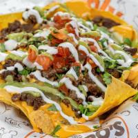 Nachos · Enjoy your choice of Chando’s signature meat selection topped with nacho cheese, cilantro, o...