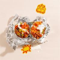 Chorizo Breakfast Burrito · Eggs, chorizo, tater tots, melted cheese, caramelized onions, avocado.