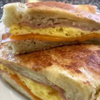 Egg, Ham & Cheese · Grilled Ham, Egg & Cheddar Cheese
Choice of bread:  Croissant, bagel, English muffin, Sourdo...