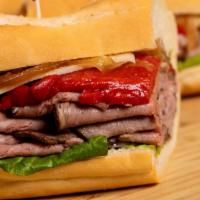 Roast Beef · Served with lettuce, tomatoes, mayo, and mustard bread choices.