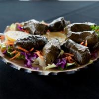 Dolmeh · Grape leaves stuffed with rice and herbs.