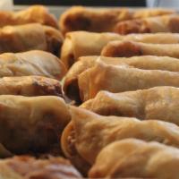 Egg Rolls · Contains gluten. Crispy pork egg rolls made with carrots, mushrooms, and mung bean noodles.