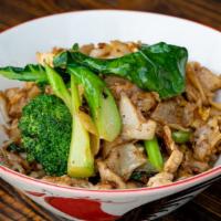 Spicy Pad Zee Ew · Spicy. Broad rice noodles stir-fried with egg, Chinese broccoli, salted soybean paste, light...