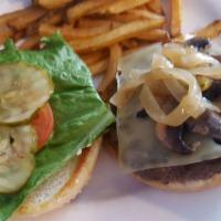 Swiss Fun Guy Burger · 1/2 lb. ground Angus burgers. Grilled mushrooms and onions. Melted swiss cheese. Served with...