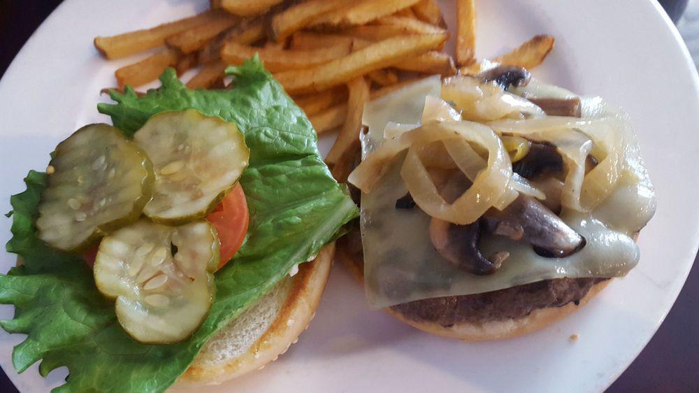 Swiss Fun Guy Burger · 1/2 lb. ground Angus burgers. Grilled mushrooms and onions. Melted swiss cheese. Served with lettuce, tomato, pickles, and red onions.