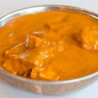 Chicken Tikka Masala · Boneless chicken tikka sauteed in masala gravy with tomatoes