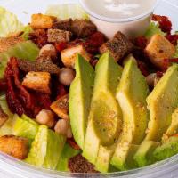 8A) Chickpea Caesar Salad In A Bowl · Chickpeas with romaine lettuce, sun-dried tomatoes, avocado slices and seasoned gluten free ...