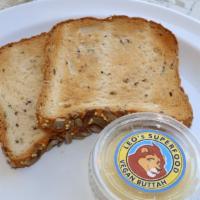 18) Buttered Bread Or Toast · Two slices of bread or toast with cultured cashew butter.