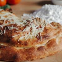 Supreme Calzone · Mozzarella, pepperoni, Italian sausage, mushrooms, green peppers, red onions, and a side of ...