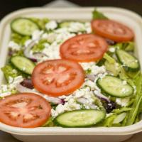 Greek Salad · Lettuce, tomatoes, onion, kalamata olives, cucumber, feta cheese, and a side of Greek dressi...