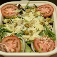 Artichoke Salad · Spring mix, artichokes, red onions, tomatoes, parmesan cheese, olives, and a side of Balsami...