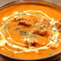 Butter Chicken · Tandoori chicken cooked with spices and butter sauce. Served with basmati rice.