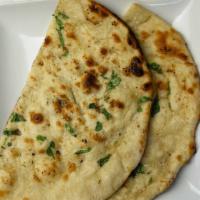 Garlic Naan · All-purpose flour bread cook with garlic and clay oven.