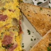 Omelettes · 4 eggs served with bread, butter, and a choice of 3 ingredients: shredded cheese, turkey bac...