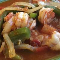Camarones Rancheros · Jumbo shrimp fried with onion, bell peppers, tomatoes simmered in our own special sauce, Ser...