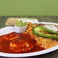Huevos Rancheros · 2 eggs any style, rice, pinto or black beans, red sauce, side of chips and guacamole, choice...