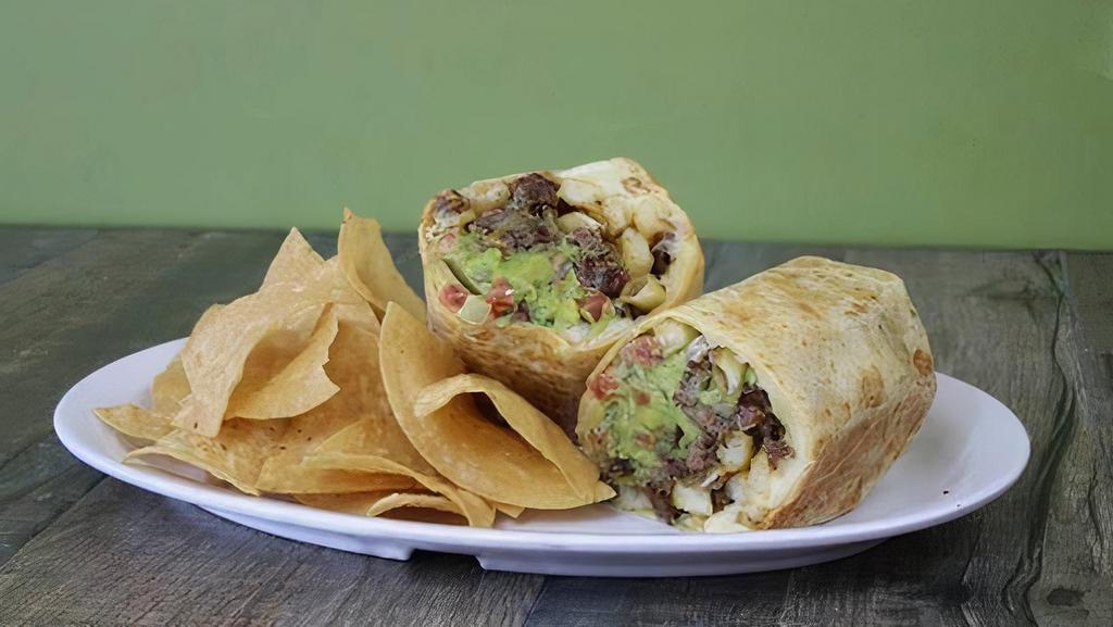 California Burrito · Your choice of protein, guacamole, Jack cheese, sour cream salsa, pico de gallo, french fries (inside) served with side of chips, salsa & guacamole.