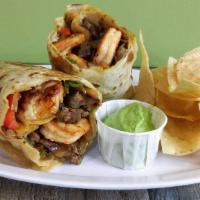 Surf N’ Turf Burrito · One of our most popular burritos! Marinated angus steak and shrimp, poblano peppers-carameli...