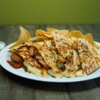 Shrimp Quesadilla · 13” flour tortilla grilled marinated shrimp, jack- cheese, caramelized onions-poblano chilie...