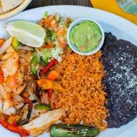Chicken Fajitas · Marinated chicken breast grilled with fresh bell peppers, onion and pico de gallo, served wi...