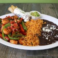 Shrimp Fajitas · Marinated shrimp grilled with fresh bell peppers, onion and pico de gallo, served with a sid...