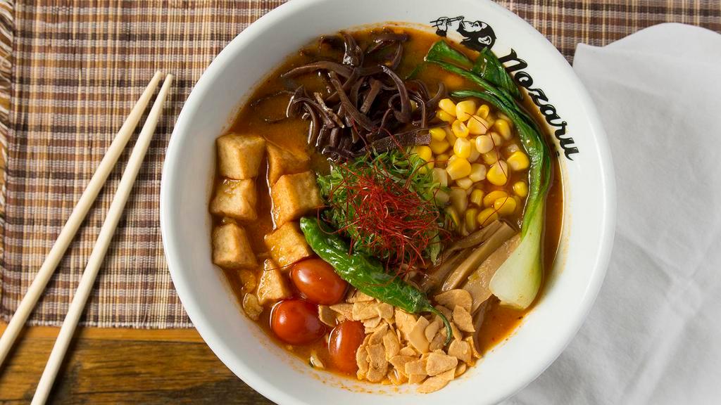 Angry Veggie · Vegan Friendly. Spicy Miso Vegetable Broth. Spicy Miso, Fried Tofu, Green Onions, Baby Bok-Choy, Bamboo Shoots, Corn, Grape Tomatoes, Black Mushrooms, Roasted Garlic Chips, and Fried Shishito Pepper.