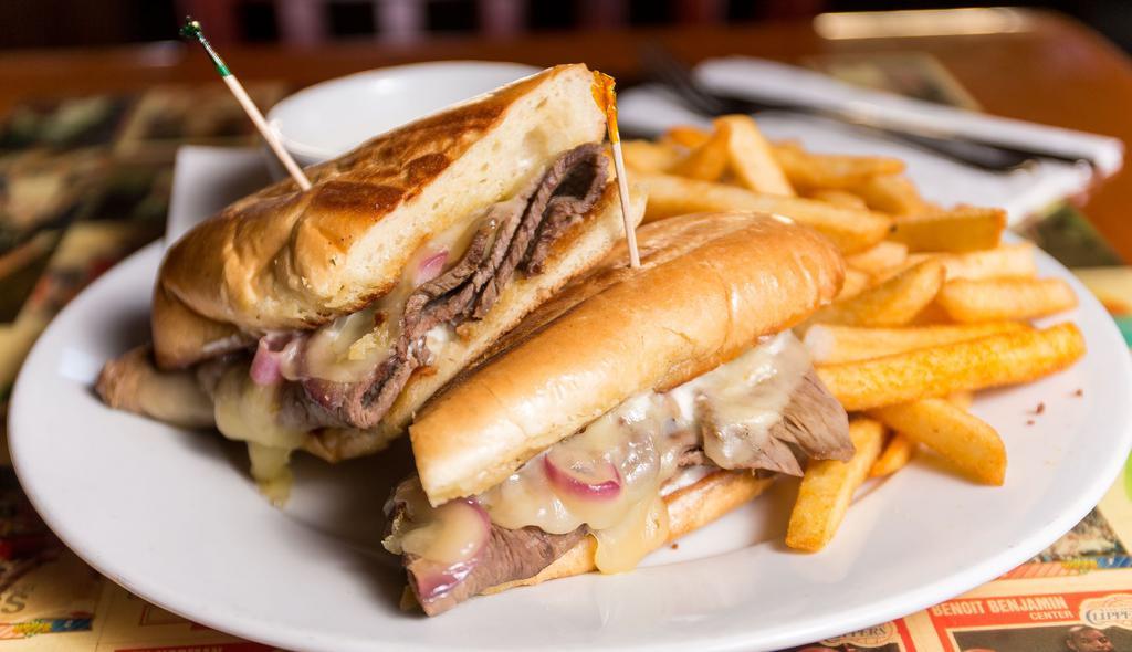 Beef Dip · Thinly sliced roast beef with grilled onions, Swiss cheese and creamy horseradish mayo. Served on a fresh French roll.