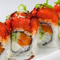 Sake Roll · Spicy salmon, cream cheese, and cucumber (In). Spicy tuna with eel sauce (Top).