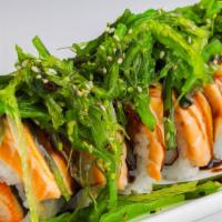 Hawaiian Roll · Spicy tuna and shrimp tempura (In). Salmon with seaweed salad (Top).